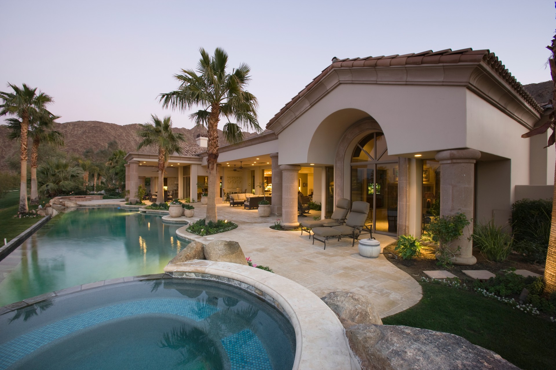 Pool And House Exterior At Dusk